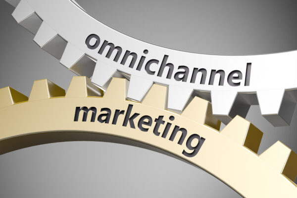 Two connected cogs depicting IMC marketing.