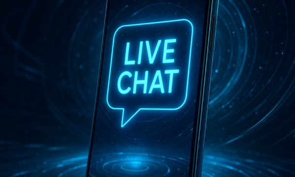 An image of a smartphone with a live chat bubble on the screen.