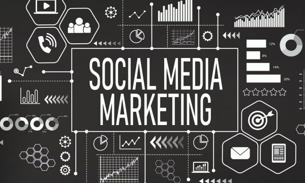 A blackboard with social media marketing and analytics around it.