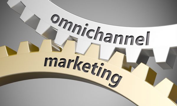 Two connected cogs depicting IMC marketing.